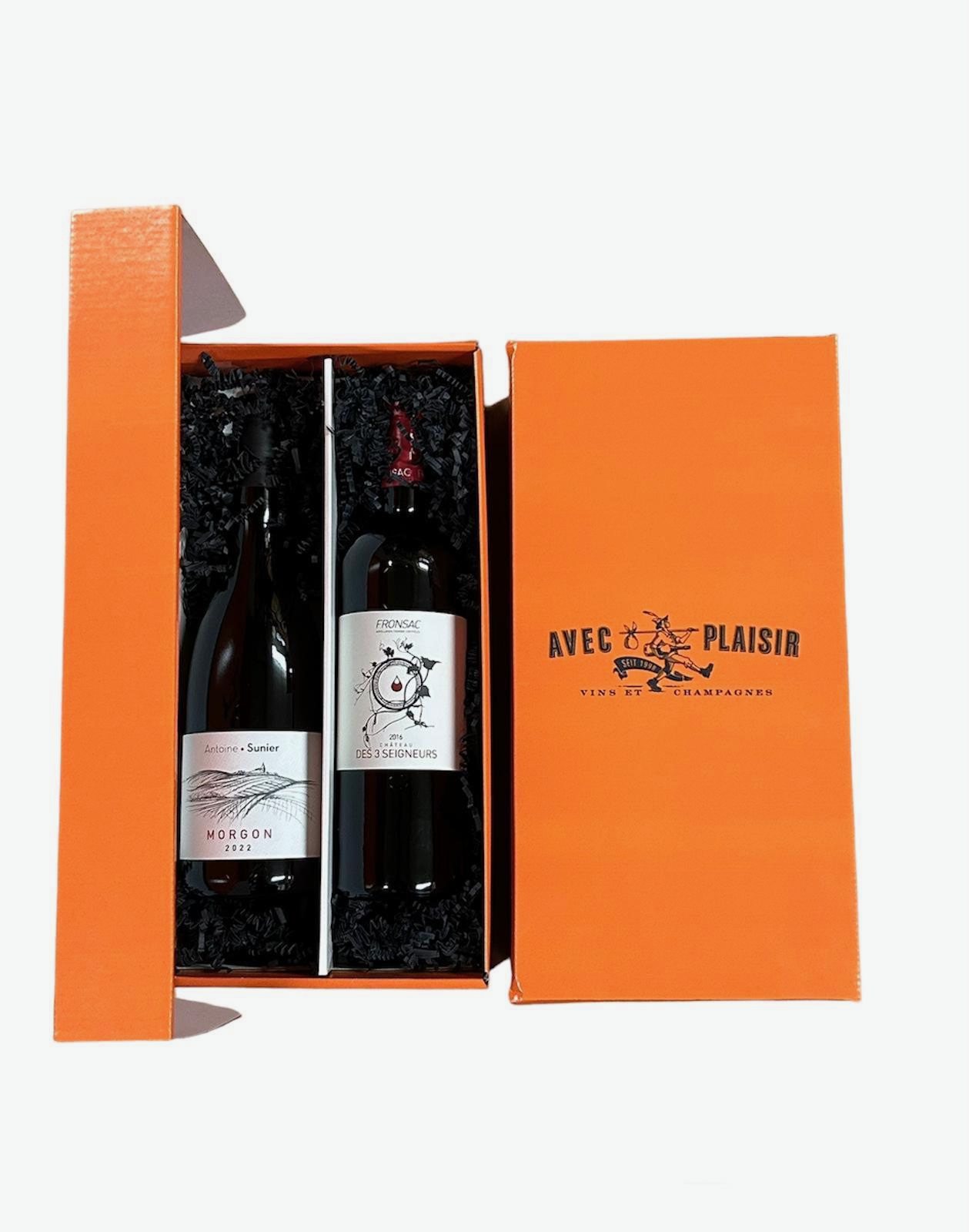 Geöffnete Avec-Plaisir-Präsentbox mit zwei Weinflaschen